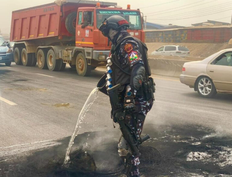 Naira Scarcity: Lagos Rapid Response Team Clears Debris Of Burnt Tyres By Angry Youths In Ogun