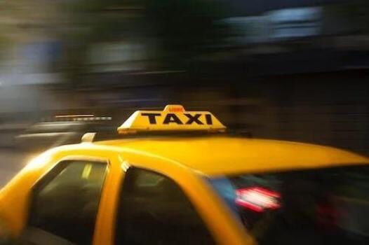Taxi Driver Loses Control After Steering-Wheel Seizure, Knocks Security Guard